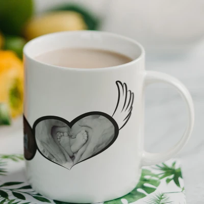 Personalizirana skodelica srce s krili in tvojo sliko